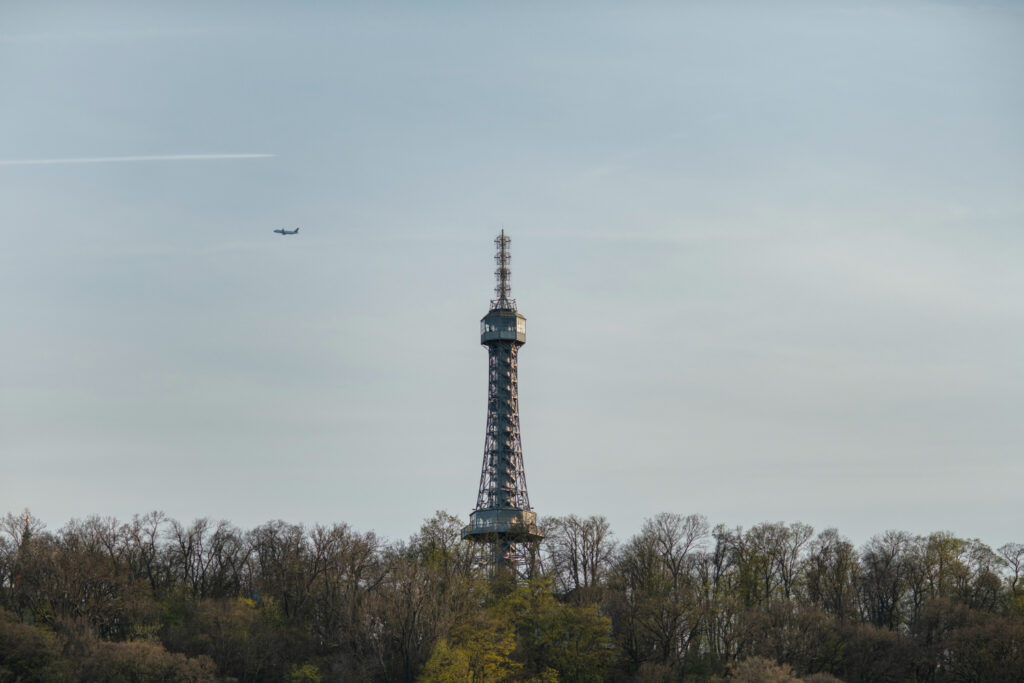 A large tower with a sky background