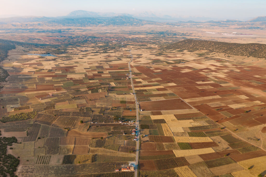 An aerial view of a large field with many different colors.